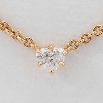 Necklace, 18K gold with heart-shaped diamond.
