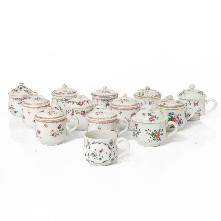 A group of 12 CHinese famille rose porcelain custard cups with covers, Qing dynasty, 18th century.