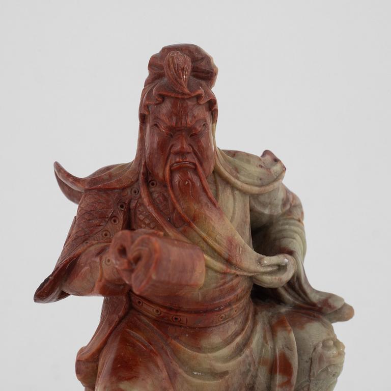 A Chinese Soapstone sculpture of the warrior god Guandi, Qing dynasty, 19th century.