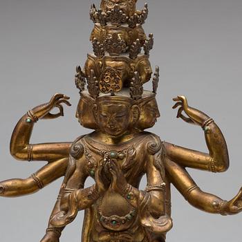 A Tibeto-Chinese gilt bronze figure of eleven-headed Avalokiteshvara, 19th Century.