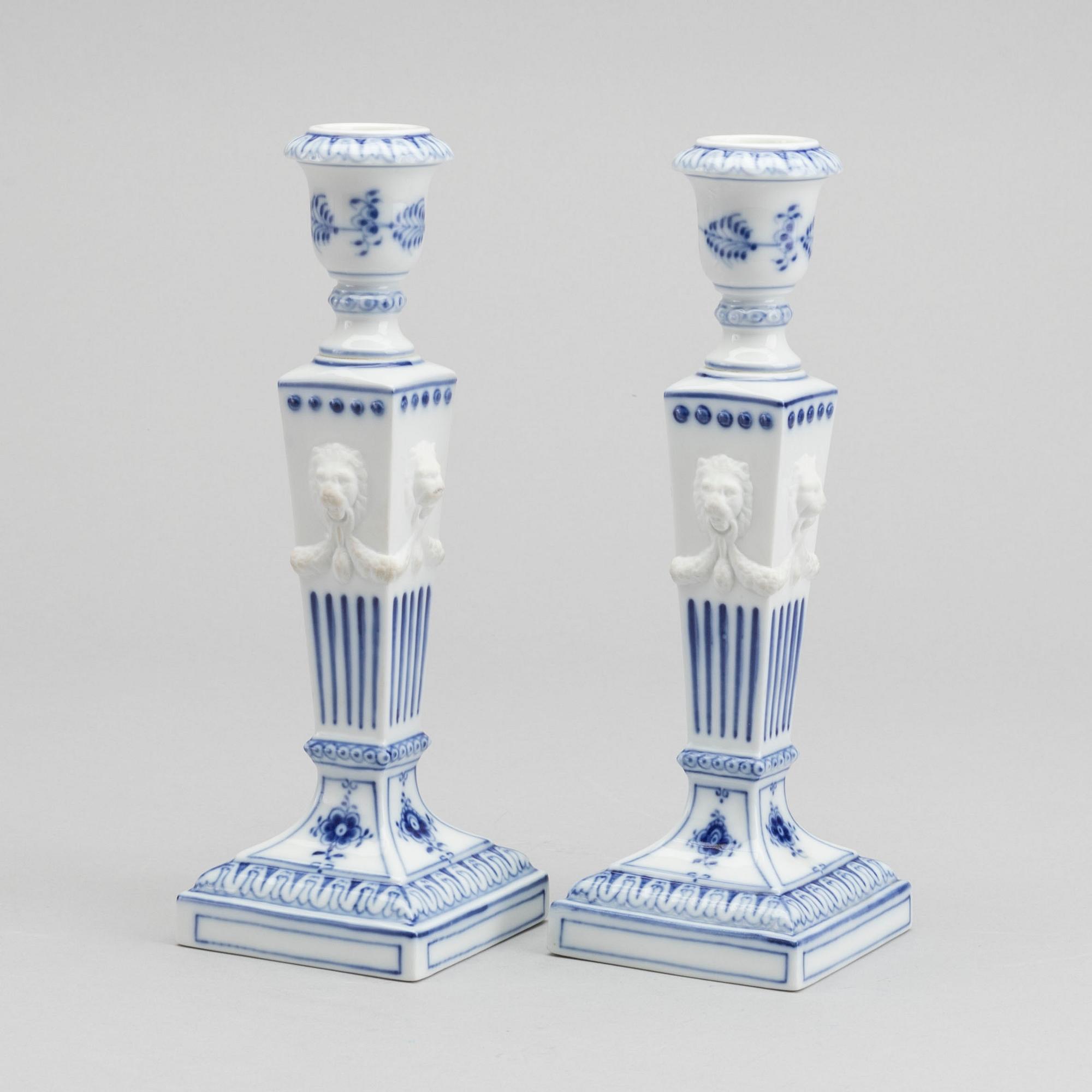 A PAIR OF ROYAL COPENHAGEN PORCELAIN CANDLE STICKS.