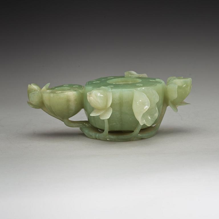 A Chinese lotusshaped serpentine stone brush washer.