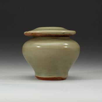 A celadon miniature jar with cover, Ming Dynasty (1368-1644).