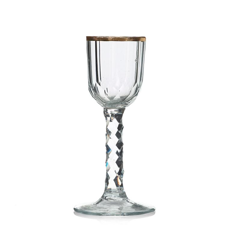 A set of 12 cut and gilded wine glasses, circa 1800.