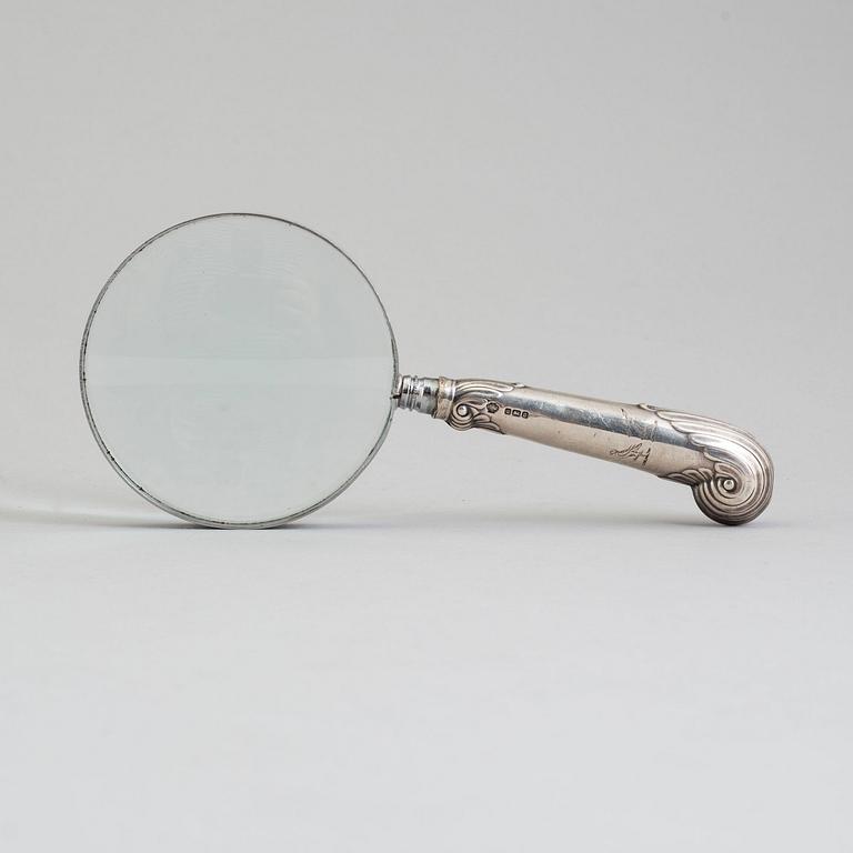 A silver magnifying glass by William Hutton & Sons, Sheffield, 1883.