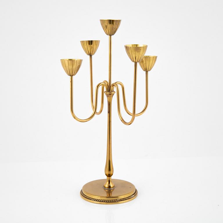 Gunnar Ander, a brass candelbrum. Ystad-Metall, Sweden, mid 20th Century.