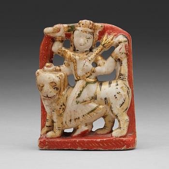 770. An alabaster sculpture of a deity on a tiger, India, 19th Century.