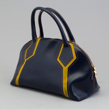 VIVIENNE WESTWOOD, a leather bag.