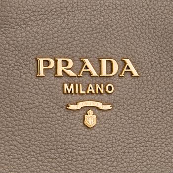 Prada, a clay gray leather handbag, 2020.