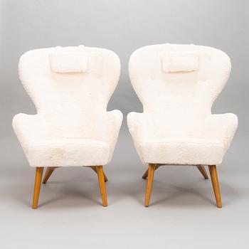 CARL GUSTAF HIORT AF ORNÄS, Two mid-20th century 'Siesta' armchairs for för Puunveisto Oy - Träsnideri Ab.