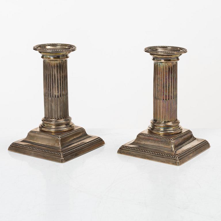 Hawksworth, Eyre & Co Ltd, a pair of silver candlesticks, Sheffield 1890.