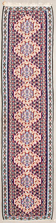 Senneh kelim rug from the gallery, semi-antique, approximately 380x87 cm.