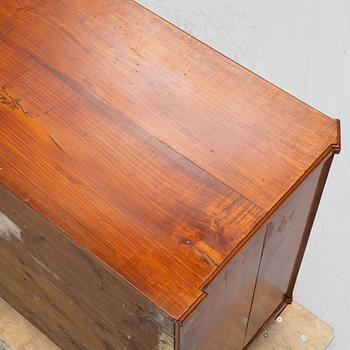 An early 19th century chest of drawers.