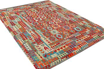 A Kilim carpet, c. 371 x 272 cm.