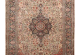 A carpet, silk Kashmir, c. 279 x 180 cm.