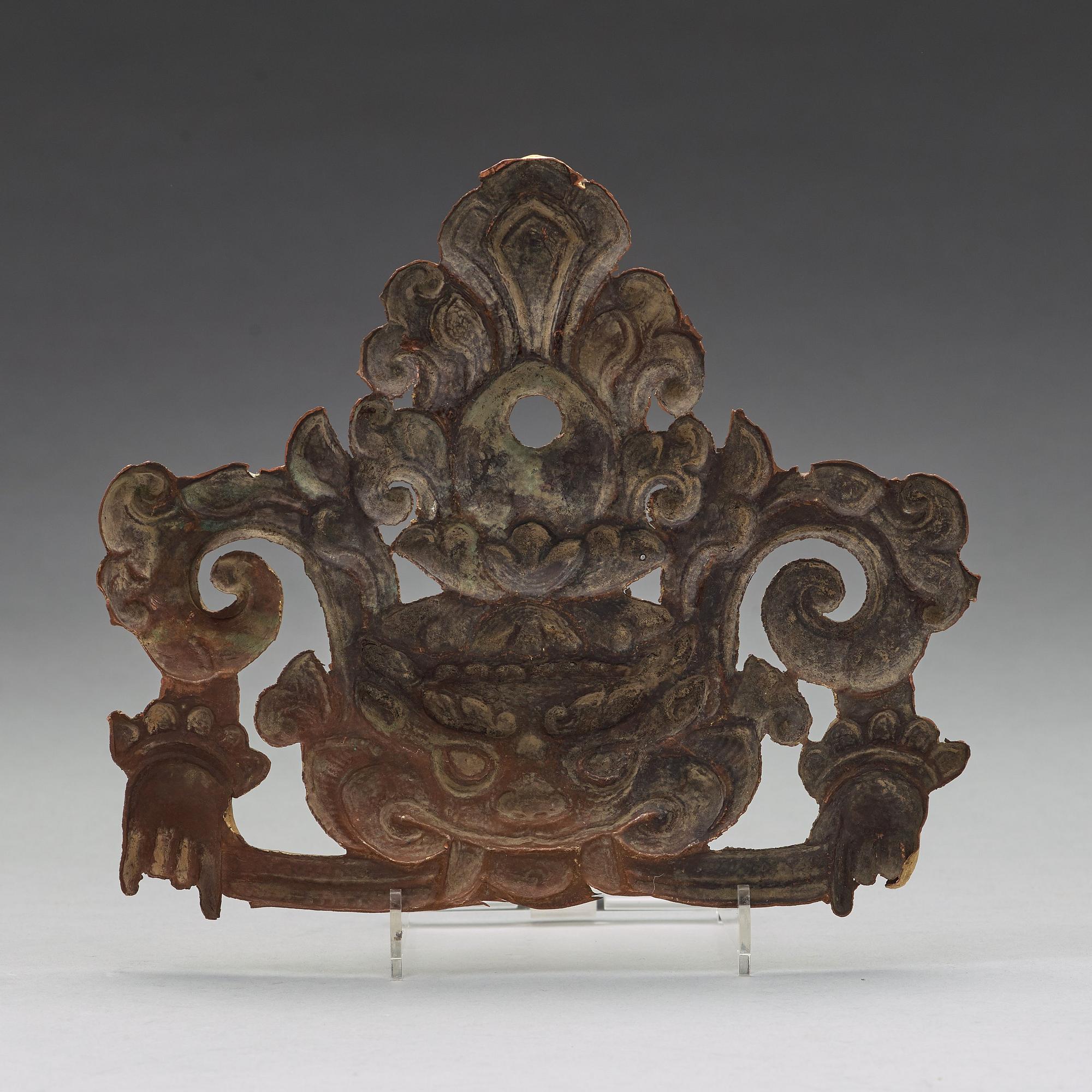 DEKORDEL, förgylld koppar legering. Tibet, troligen 1800-tal.
