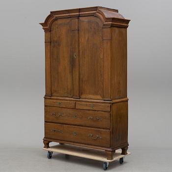 A 18th century oak rococo cabinet.