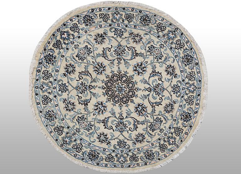 A rug, Nain, part silk, ca 136 x 136 cm.