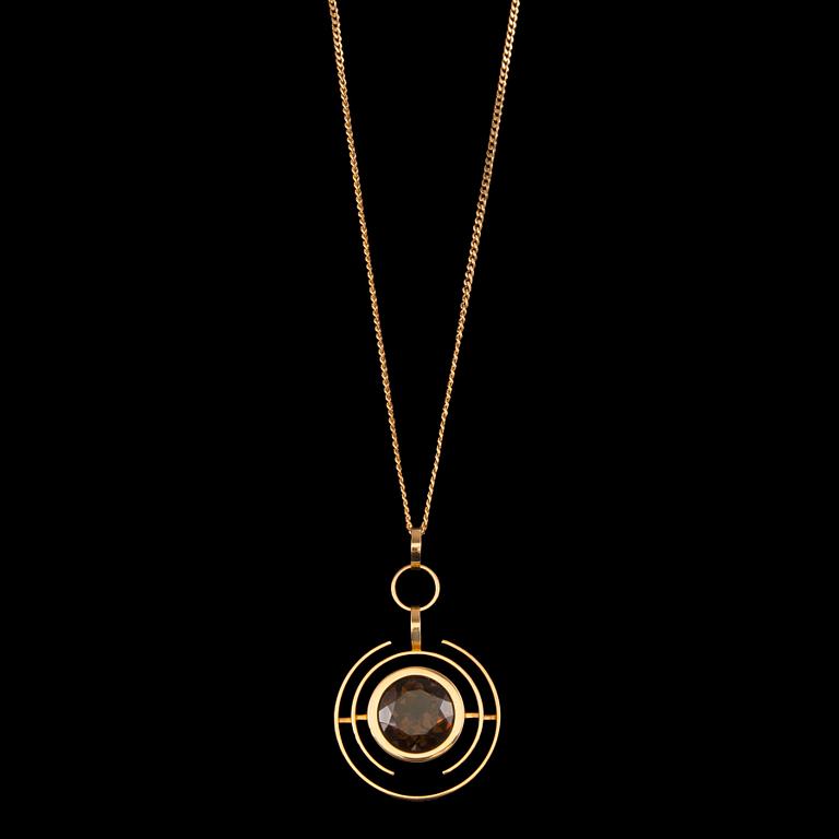 Elis Kauppi, A PENDANT, gold 14K, smoky quartz, Kupittaan Kulta 1965. Weight 28,5 g.