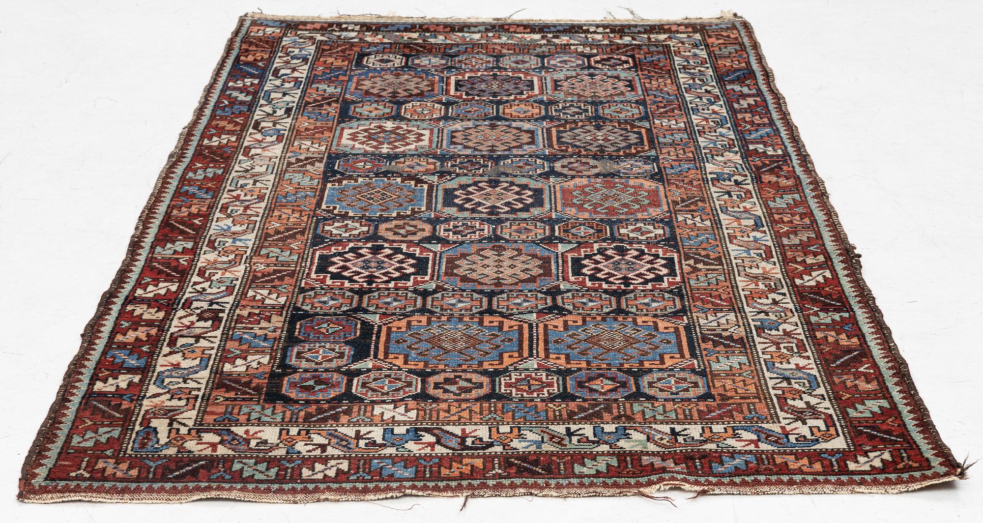 A Northwest Persian antique rug, c. 166 x 106 cm.