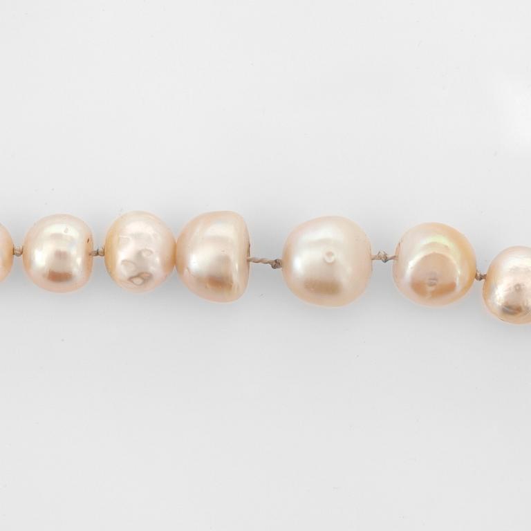 A baroque, possibly natural, pearl necklace.