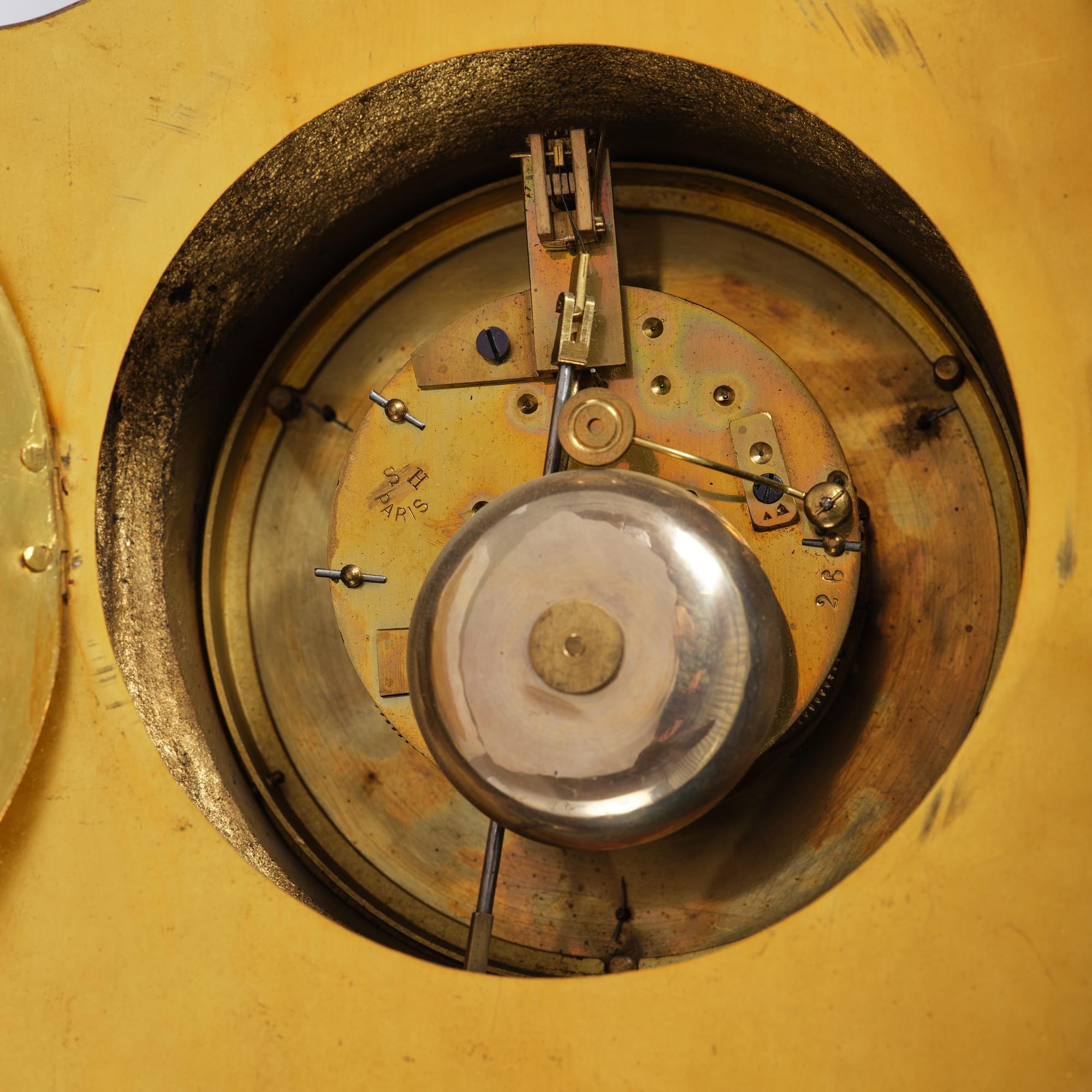 A French  Louis XVI-style wall clock, around 1900.