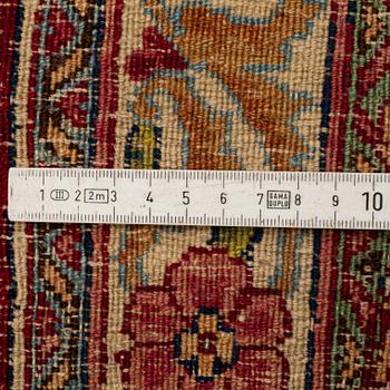 A CARPET, , semi-antique Kerman, ca 431 x 296 cm.