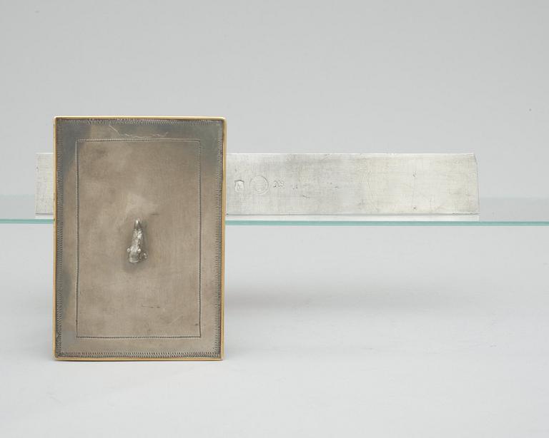 A Svenskt Tenn pewter box and a ruler, Stockholm 1927 and 1972.