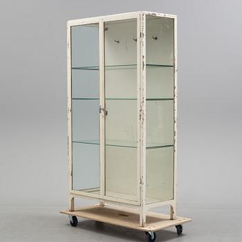 A mid 20th century metal display cabinet.