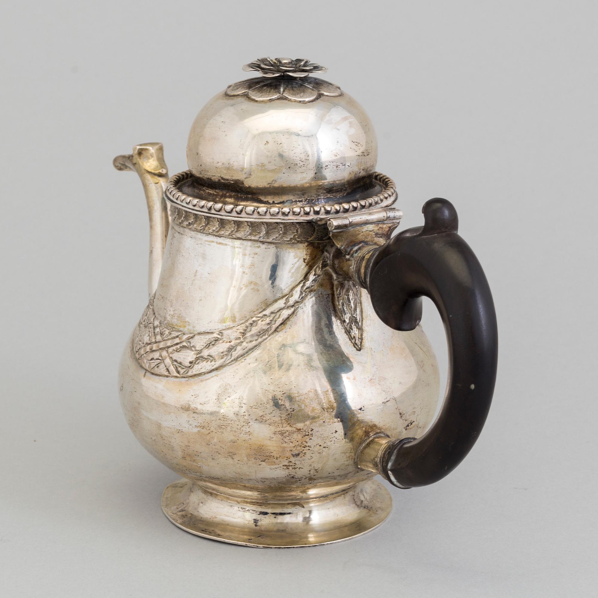 A late 18th century silver teapot.