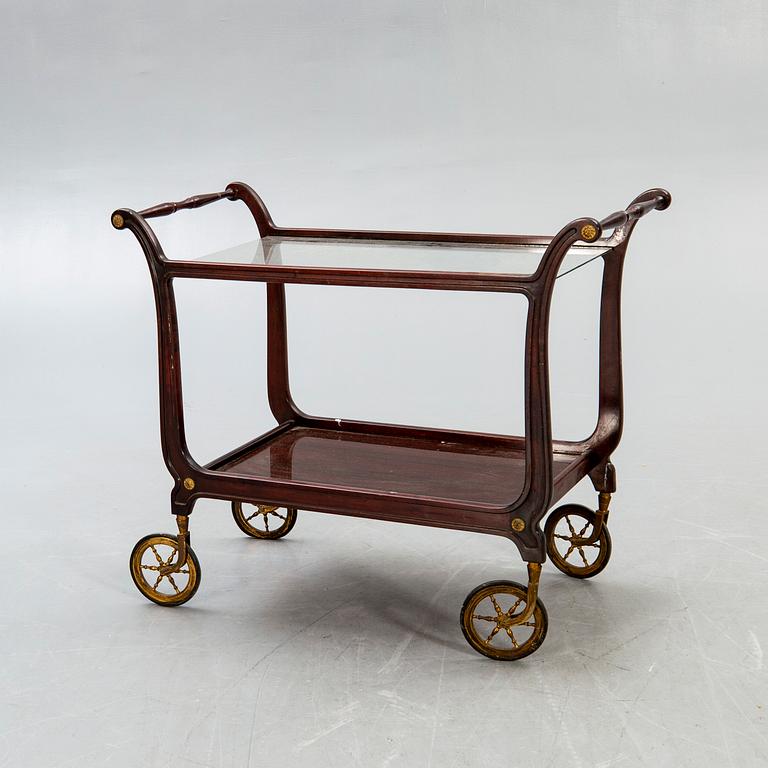 A mid 1900s mahogany serving trolley.