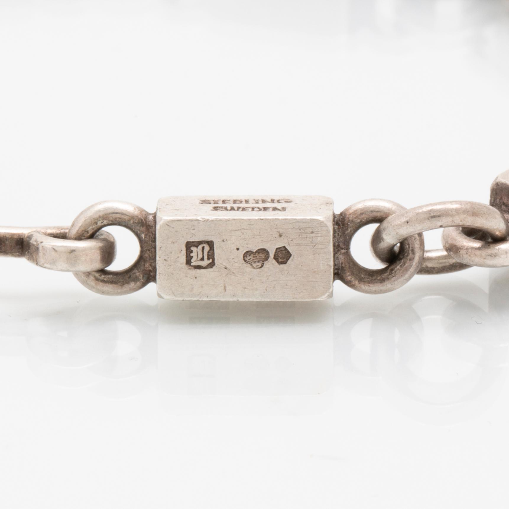 A Swedish sterling sivler bracelet mark of Wiwen Nilsson Lund 1962 length 24 cm, weight 347 grams,