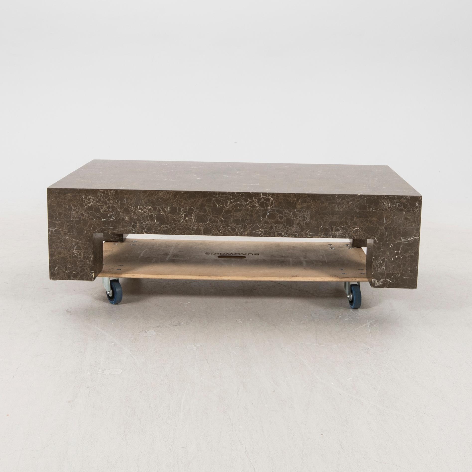 A late 20th century travertine coffee table.