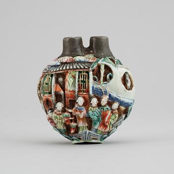 A famille rose moulded snuff bottle, Qing dynasty, 19th century.