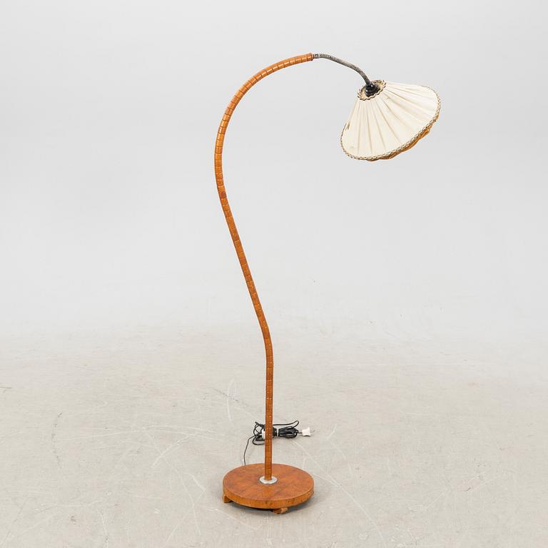 A 1940s floor lamp.
