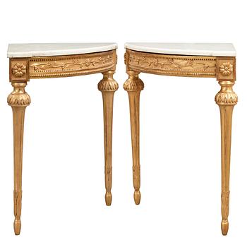 A pair of Gustavian late 18th century corner console tables.