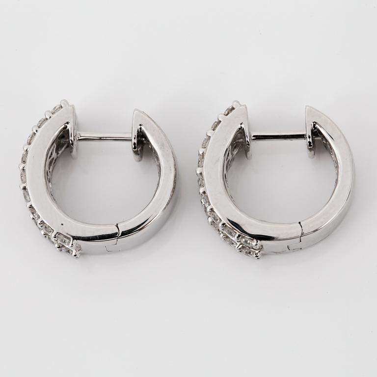 EARRINGS, huggies with round and baguette cut diamonds circa 1.3cts.