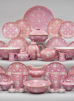 A pink ground Lotus service, China, early 20th Century. (137 pieces).