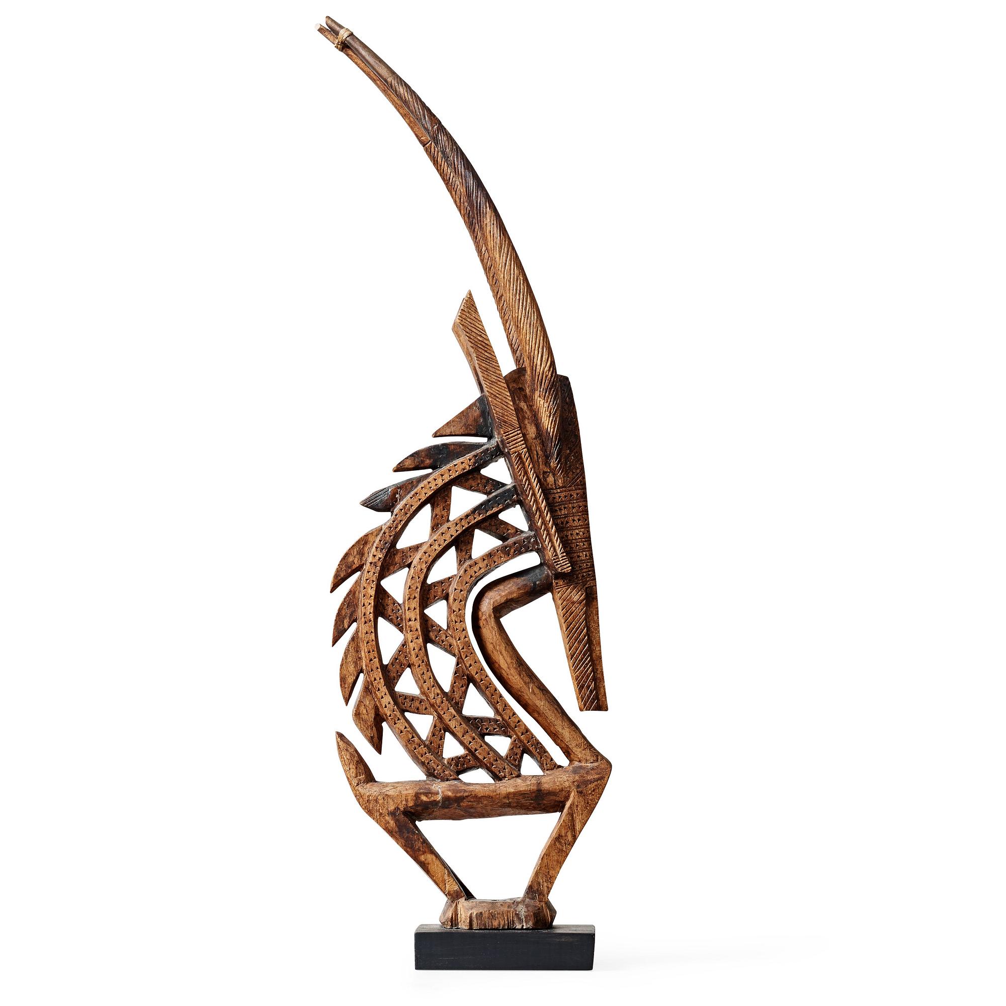 HEADDRESS Tshiwara/Ciwara (stylized male antelope). Wooden sculpture.
