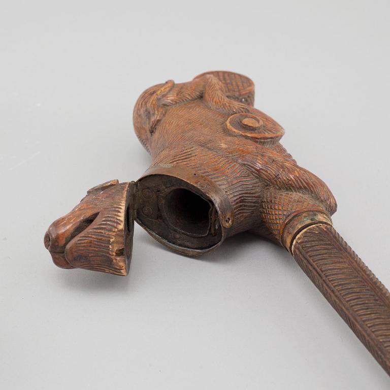 Three mainly 19th century pipes, one dated 1711.