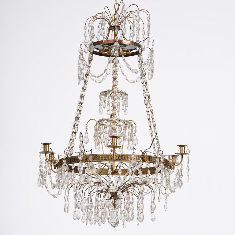 A Late gustavian green top glass six light chandelier.
