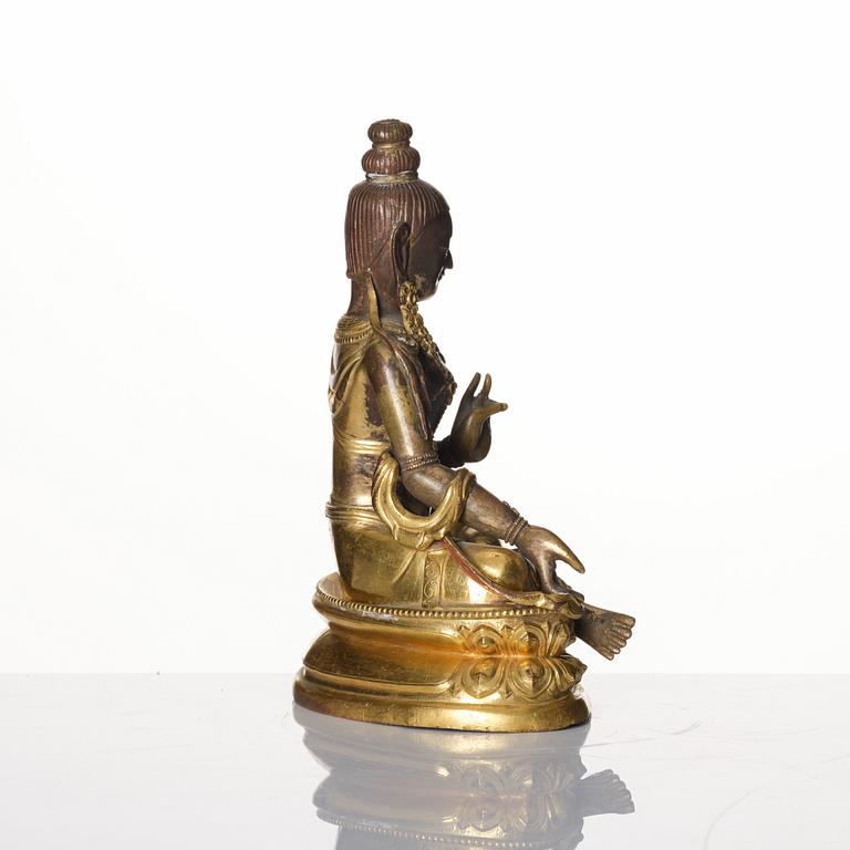 A gilt copper alloy figure of Tara, Tibet, circa 1800.