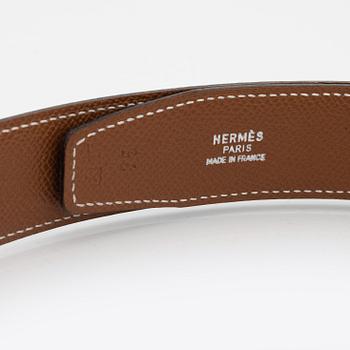 Hermès, A reversible leather and palladium hardware 'Constance' belt from 1997.