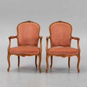 A pair of Louis XVI beechwood armchairs, 18th Century.