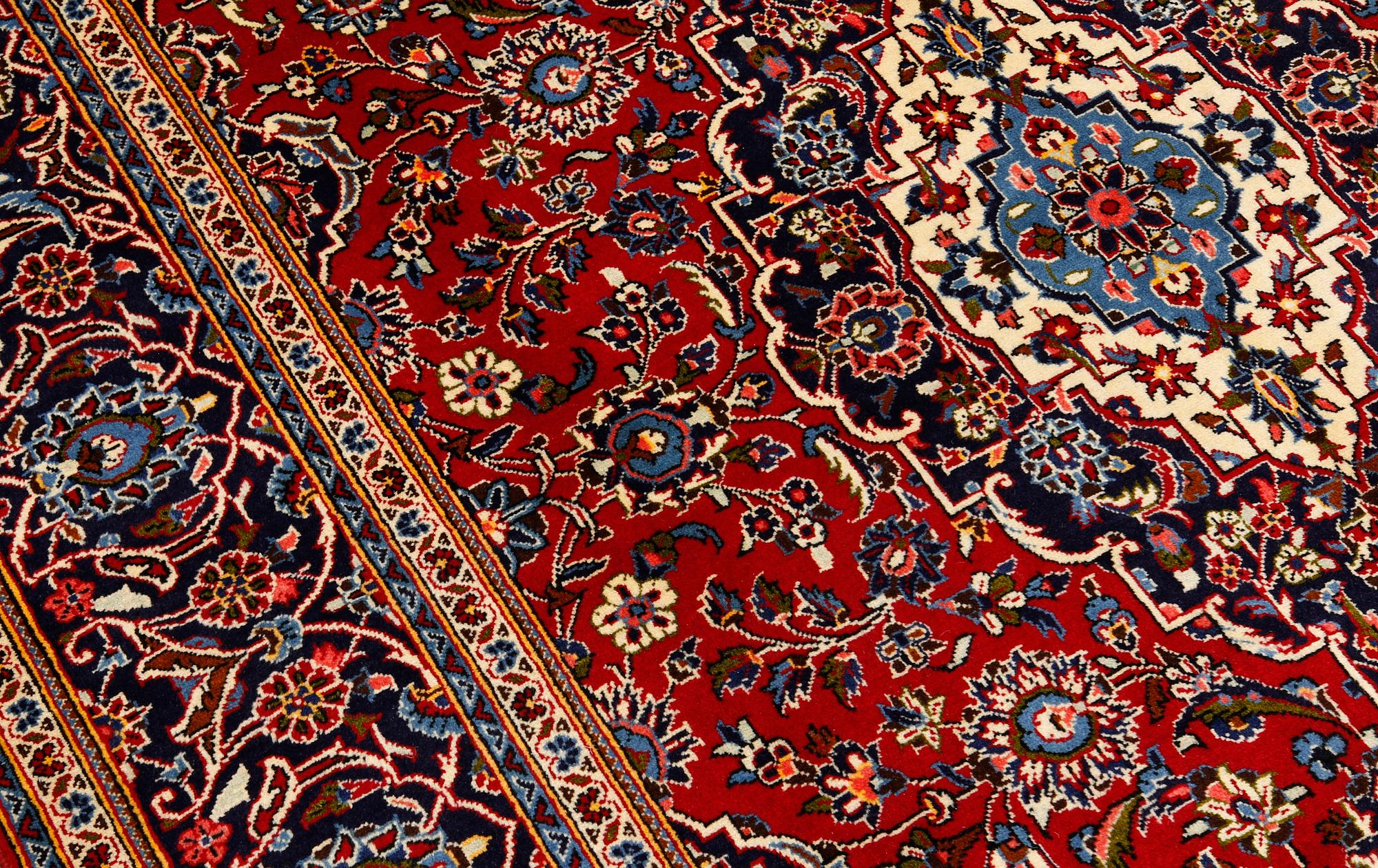 A Keshan rug, approx. 307 x 195 cm.