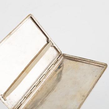 A silver cigarette case, Iran, first half of the 20th Century.