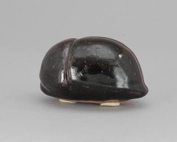 52. An Ulla Kraitz ceramic beetle.
