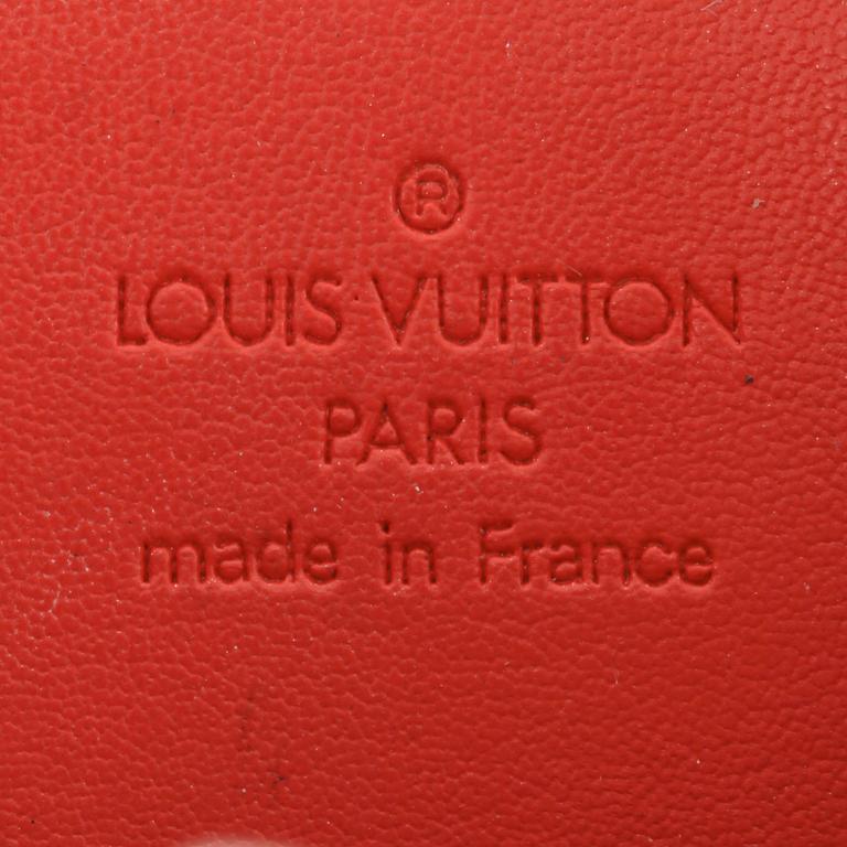 LOUIS VUITTON, a orange monogrammed vernis shoulder bag with flowers "Lexington Pochette", limited edition 2002.