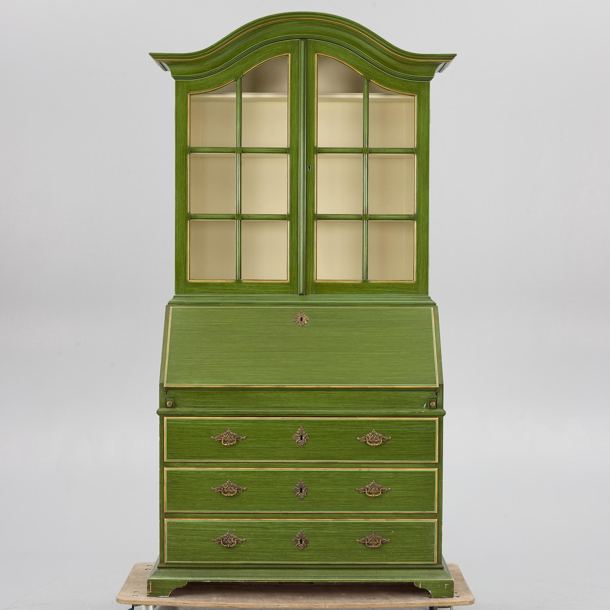 A Rococo style display cabinet, second half of the 20th Century.