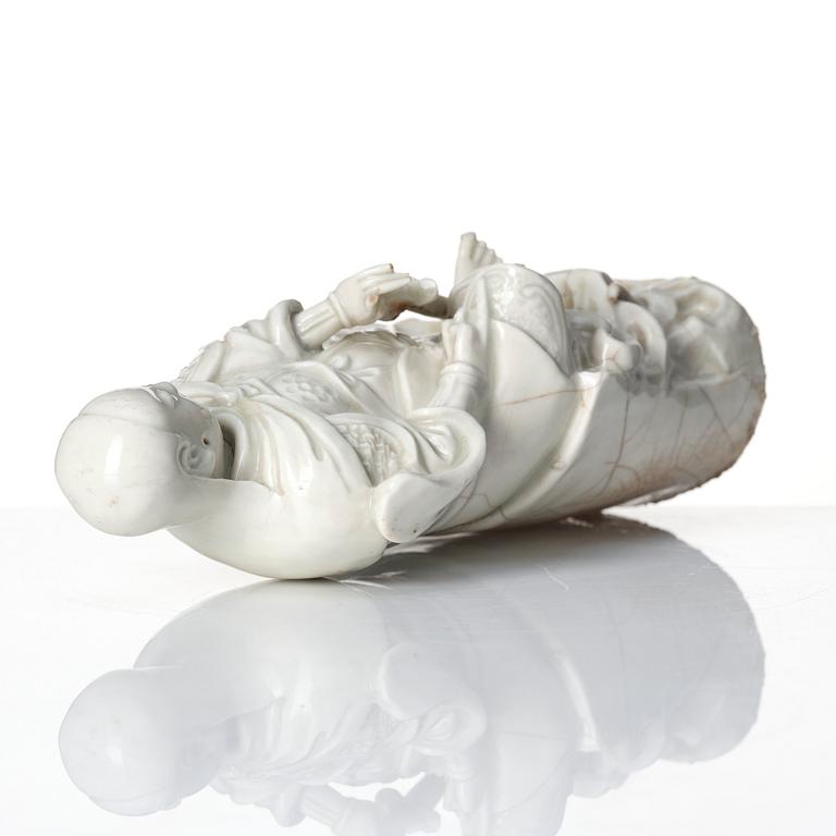 A Chinese blanc de chine/dehua figure of a Zhenwu, late Ming dynasty (17th century).